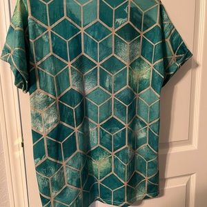 Cotton/polyester, nice design, greens colors, comfy top